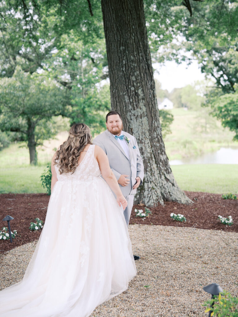 Bride and groom first look at NC Barn Venue