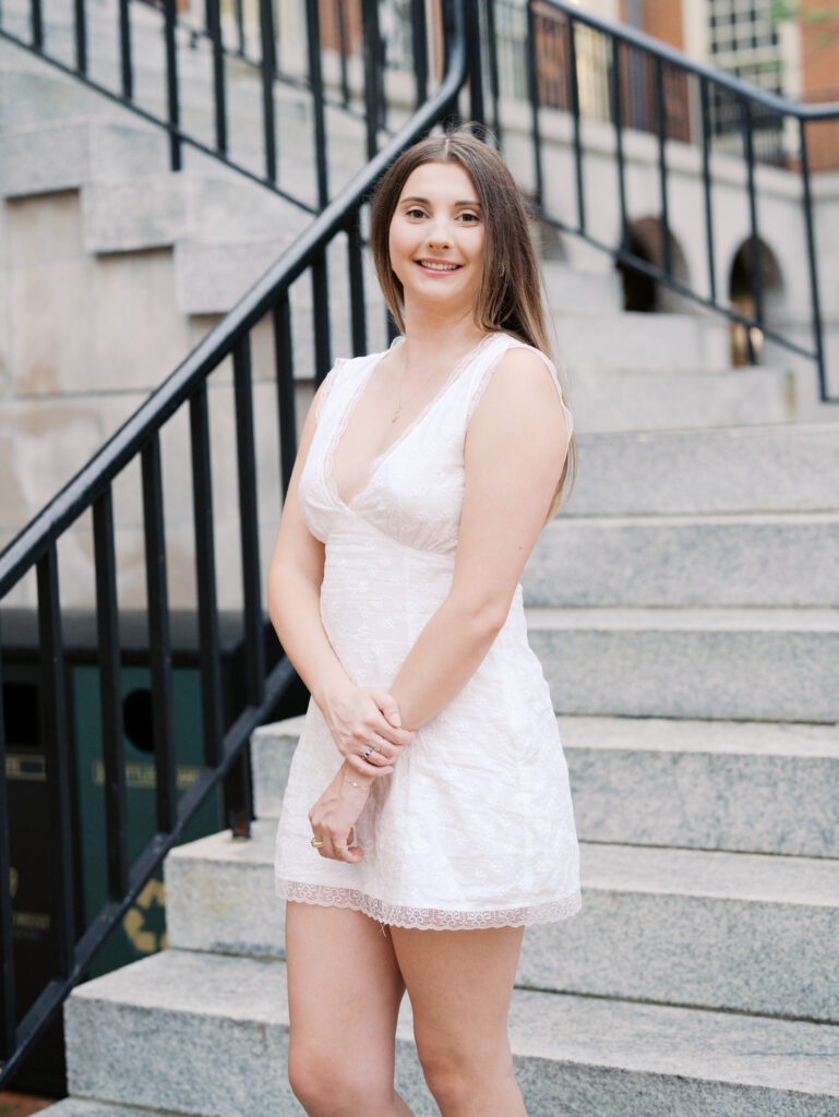 Natural graduation photos at Wake Forest University with movement and laughter